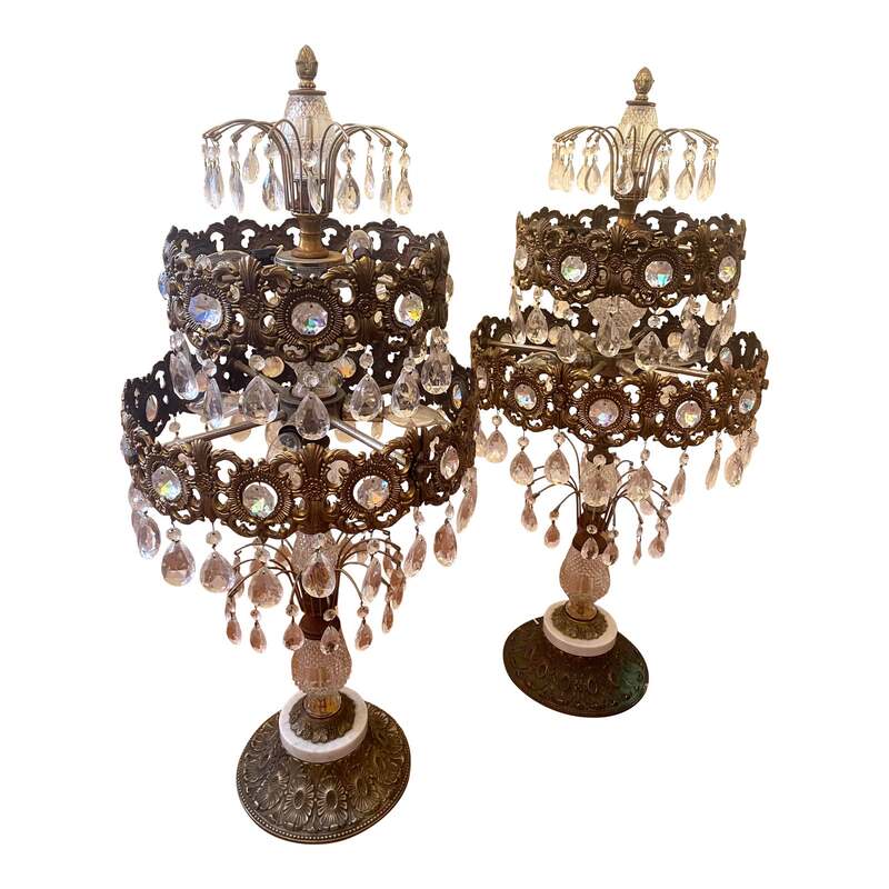 Make a statement with this set of 3 foot tall French Girandole table lamps. Heavy bronze and marble base, glass necks, and dripping with waterfall crystals. Original wiring in working condition, some rust on brass and metal joints.