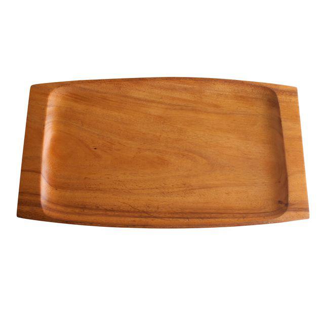 A beautiful solid acacia wood serving tray with multiple uses. Corral items on your desk, bring someone special breakfast in bed, organize your coffee table or fill with all your home bar goodies.