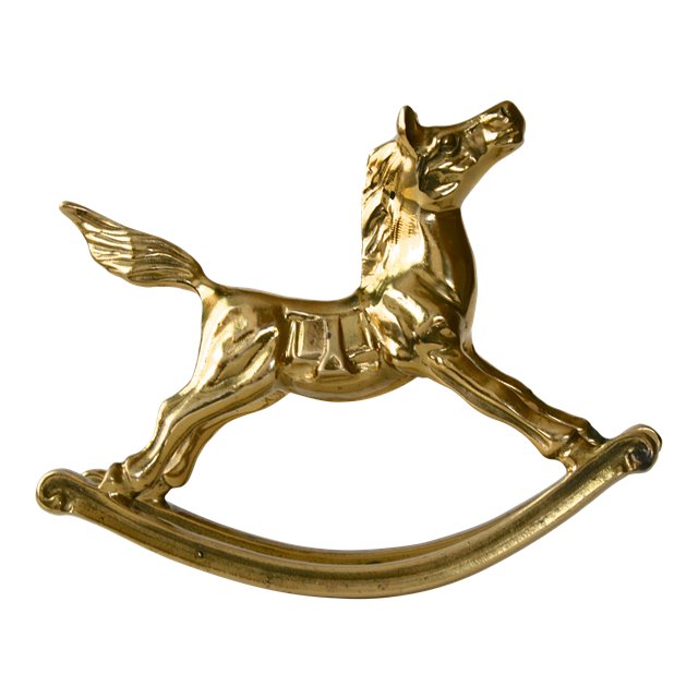 Adorable vintage solid brass rocking horse. A terrific addition to a 