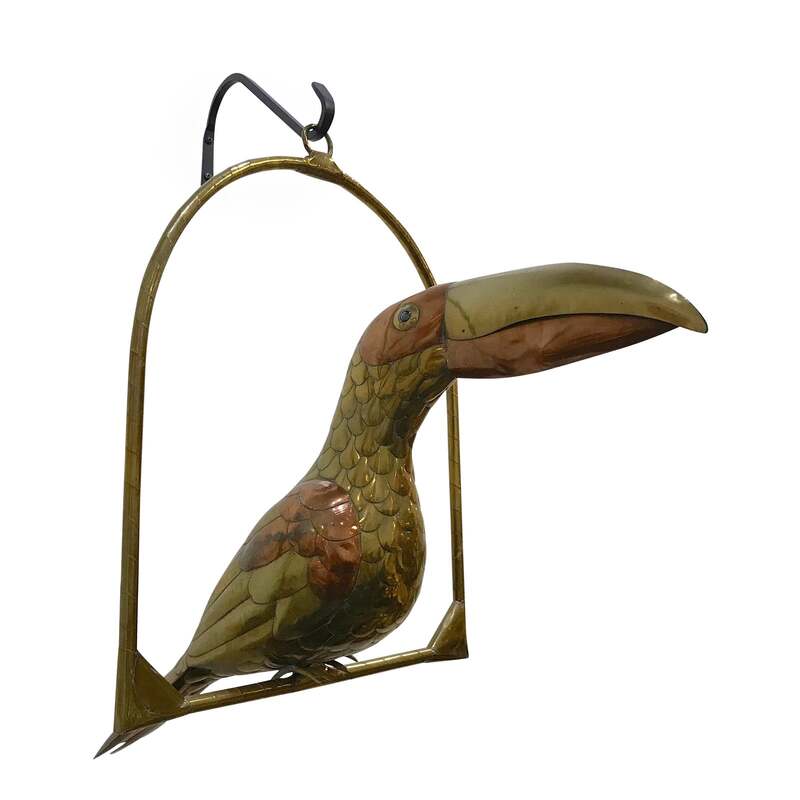 Unique brass and copper toucan on hanging perch sculpture by Sergio Bustamante. In original unpolished condition. Perch: 16