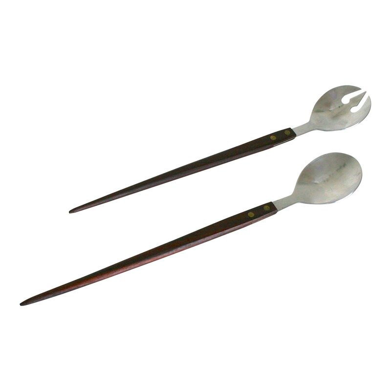 Wood and Stainless Steel salad servers. Back Marked: Federal Cutlery Co., Stainless Steel, Japan Missing one rivet on the back of the handle of the fork server. Dimensions: 2ʺW × 0.25ʺD × 13ʺH