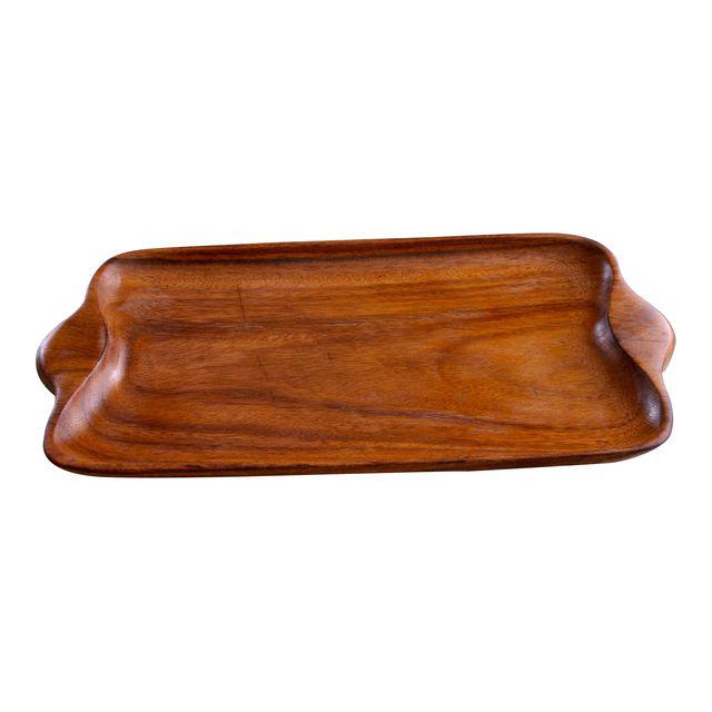 This vintage wood platter has endless uses! It makes a wonderful cheese board, a lovely place for a collection of candles, display space for jewelry on your dresser or to corral your bar cart goodies. It shows its age with a few knife marks. It is now ready for a new home after a light sanding and a couple of coats of food-grade mineral oil. Dimensions: 9.5ʺW × 17ʺD × 0.75ʺH