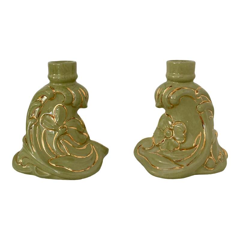 Vintage set of 2 Holland Mold ceramic taper candlesticks. A wave-like floral scroll design in green with gold accents on the flowers. 