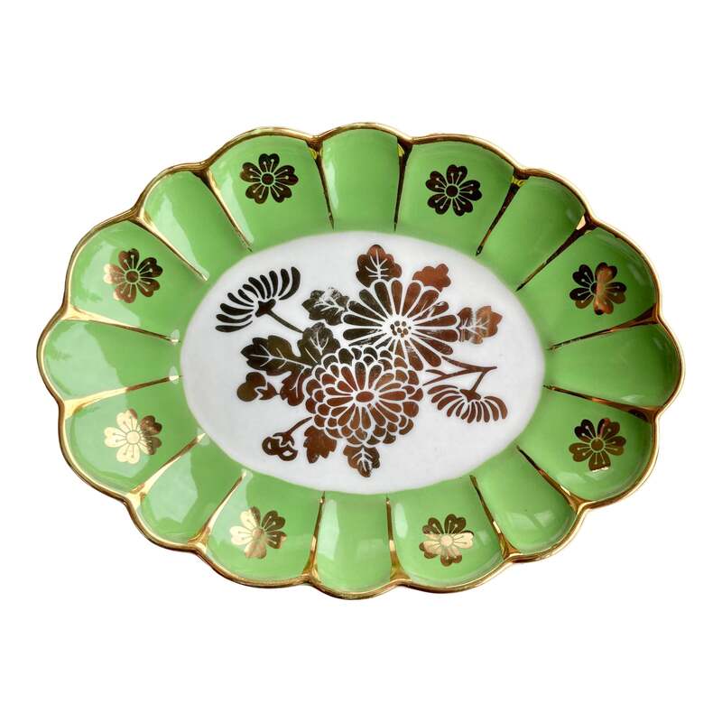 Beautiful vintage green bowl with gold flowers and edges. Perfect for those special pieces or everyday jewelry!